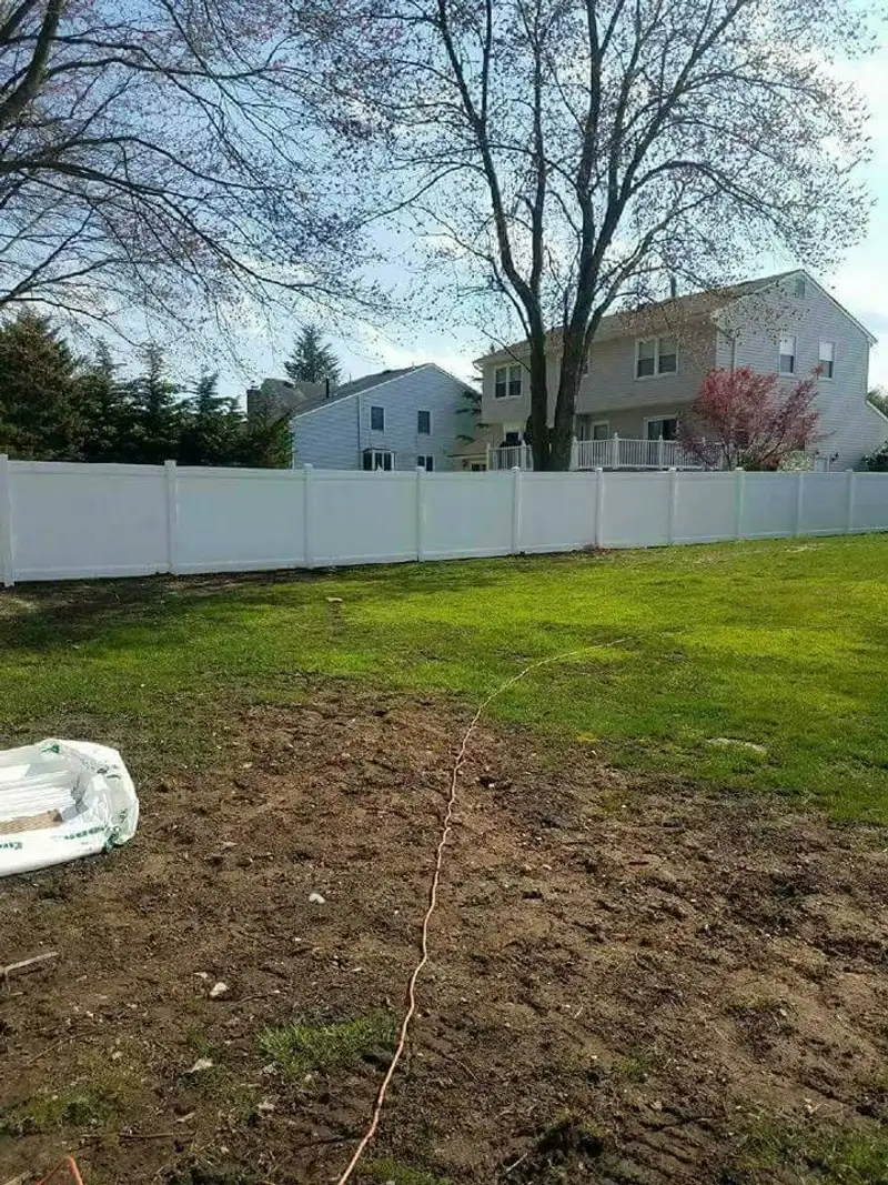 Vinyl privacy fence residential installation by Fencing By Excellence near Freehold, Monmouth County NJ