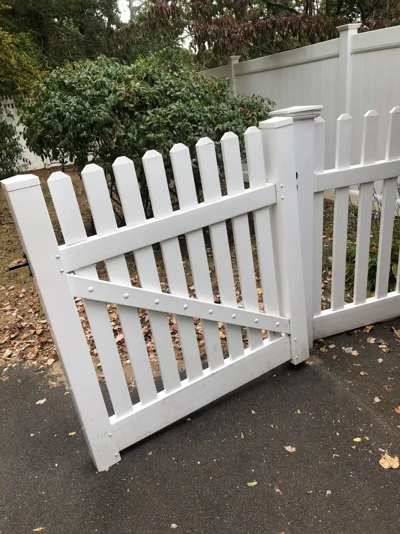 White vinyl scalloped picket gate and fence by Fencing By Excellence near Union Beach, Monmouth County NJ